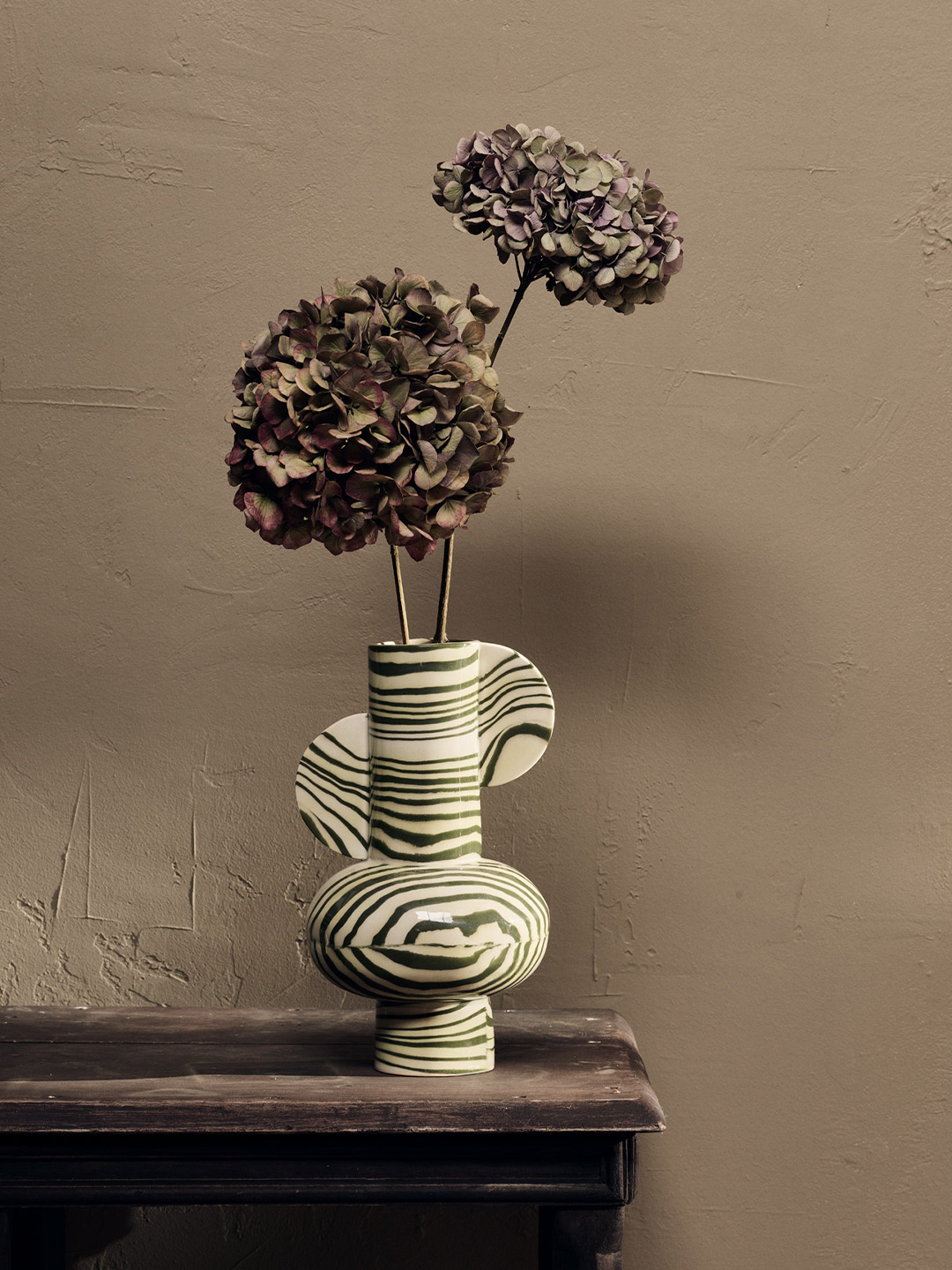 Marbled ceramics: Vases and candle holders by Henry Holland