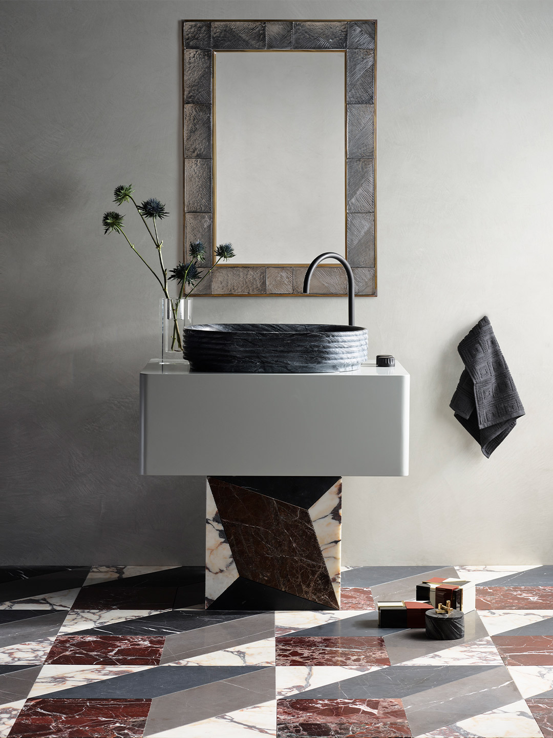 Largo collection of stone washbasins and tiles by Greg Natale for Teranova