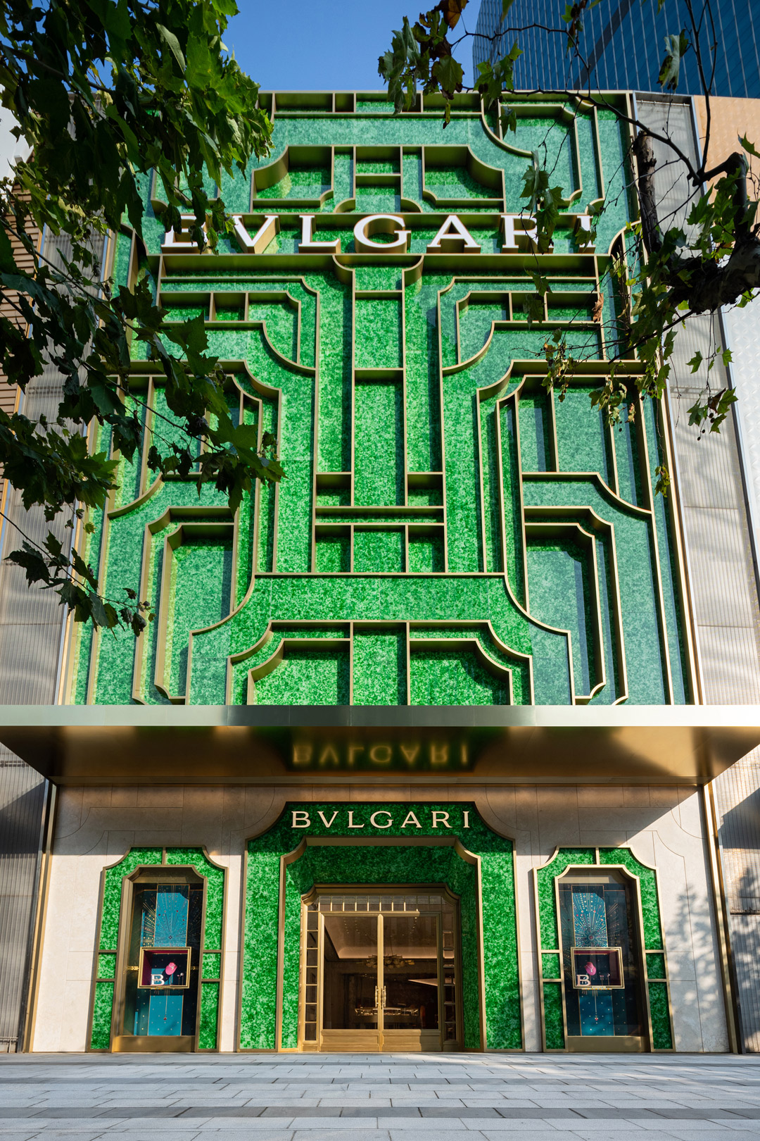 Emerald city: Old champagne bottles form the facade of Bulgari Shanghai